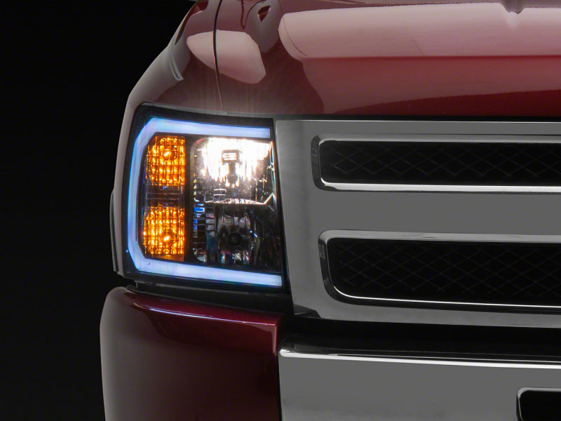 Raxiom 07-13 Chevrolet Silverado 1500 Axial Headlights w/ SEQL LED Bar- Black Housing (Clear Lens)