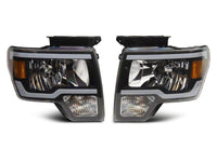Raxiom 09-14 Ford F-150 Axial Series Headlight w/ SEQL LED Bar- Black Housing (Clear Lens)