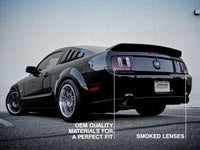 Raxiom 05-09 Ford Mustang Coyote Tail Lights- Black Housing (Smoked Lens)