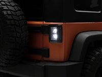 Raxiom 07-18 Jeep Wrangler JK Axial Series Vision LED Tail Lights- Black Housing (Clear Lens)