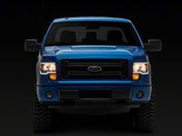 Raxiom 09-14 Ford F-150 Axial Series Headlight w/ SEQL LED Bar- Black Housing (Clear Lens)