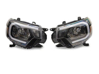 Raxiom 12-15 Toyota Tacoma Axial Series Headlights w/ LED Bar- Black Housing (Clear Lens)