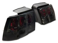 Raxiom 99-04 Ford Mustang Axial Series Altezza Style Tail Lights- Black Housing (Smoked Lens)