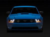 Raxiom 10-12 Ford Mustang LED Projector Headlights SEQL Turn Signals- Black Housing (Clear Lens)