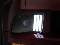 Raxiom 05-09 Ford Mustang w/ Halogen Projector Headlights- Black Housing (Clear Lens) (No GT500 )