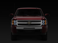 Raxiom 07-13 Silverado 1500 Super White LED Halo Projector Headlights- Black Housing (Clear Lens)