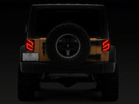 Raxiom 07-18 Jeep Wrangler JK Axial Series Trident LED Tail Lights- Black Housing (Clear Lens)