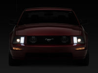 Raxiom 05-09 Ford Mustang w/ Halogen Projector Headlights- Black Housing (Clear Lens) (No GT500 )