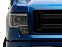 Raxiom 09-14 Ford F-150 Axial Series Headlights w/ LED Bar- Black Housing (Clear Lens)