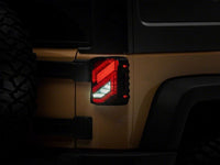 Raxiom 07-18 Jeep Wrangler JK Axial Series Trident LED Tail Lights- Black Housing (Clear Lens)