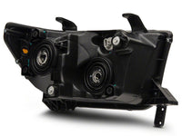 Raxiom 07-13 Toyota Tundra Axial Series Projector Headlights w/ LED Bar- Black Housing (Clear Lens)