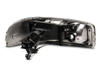 Raxiom 99-06 GMC Sierra 1500 Axial Series Headlights w/ LED Bar- Black Housing (Clear Lens)