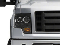 Raxiom 09-14 Ford F-150 Super White LED Halo Projector Headlights- Black Housing (Clear Lens)