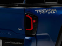 Raxiom 16-23 Toyota Tacoma Axial Series LED Tail Lights- Black Housing- Smoked Lens