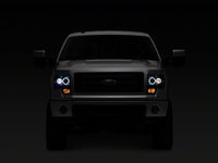 Raxiom 09-14 Ford F-150 Super White LED Halo Projector Headlights- Black Housing (Clear Lens)