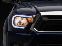 Raxiom 12-15 Toyota Tacoma Axial Series Headlights/Seq LED Bar- Black- Clear Lens