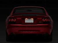 Raxiom 99-04 Ford Mustang Axial Series Altezza Style Tail Lights- Black Housing (Smoked Lens)