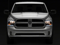 Raxiom 09-18 Dodge RAM 1500/2500/3500 Axial Headlights w/ SEQL LED Bar- Black Housing (Clear Lens)
