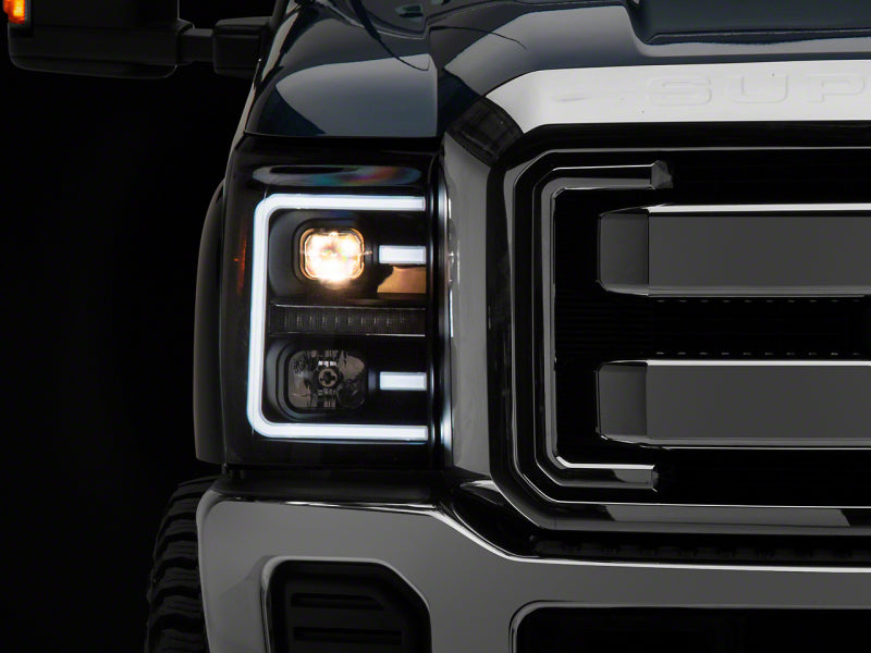 Raxiom 11-16 Ford F-250 Super Duty LED Projector Headlights - Black Housing (Clear Lens)