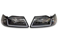 Raxiom 99-04 Ford Mustang Axial Series Headlights w/ Sequential LED Bar- Black Housing (Clear Lens)