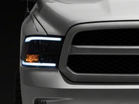 Raxiom 09-18 Dodge RAM 1500/2500/3500 Axial Headlights w/ SEQL LED Bar- Black Housing (Clear Lens)