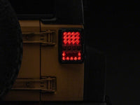 Raxiom 07-18 Jeep Wrangler JK Axial Series Lux LED Tail Lights- Black Housing (Clear Lens)