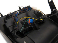 Raxiom 07-13 Chevrolet Silverado 1500 Axial Headlights w/ SEQL LED Bar- Black Housing (Clear Lens)
