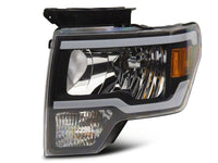 Raxiom 09-14 Ford F-150 Axial Series Headlight w/ SEQL LED Bar- Black Housing (Clear Lens)