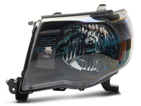 Raxiom 05-11 Toyota Tacoma Axial Series OE Replacement Headlights- Black Housing (Clear Lens)