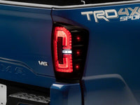 Raxiom 16-23 Toyota Tacoma LED Tail Lights- Black Housing (Smoked Lens)