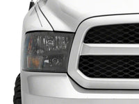 Raxiom 09-18 Dodge RAM 1500 Axial Series Euro Style Headlights w/ Dual Bulb Blk Housing (Clear Lens)