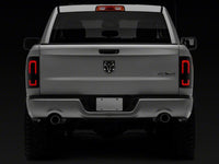 Raxiom 09-18 Dodge RAM 1500/2500/3500 Axial Series LED Tail Lights- Black Housing (Smoked Lens)