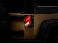Raxiom 07-18 Jeep Wrangler JK Axial Series Trident LED Tail Lights- Black Housing (Smoked Lens)