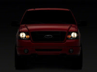 Raxiom 04-08 Ford F-150 Axial Series OEM Style Replacement Headlights- Chrome Housing- Smoked Lens